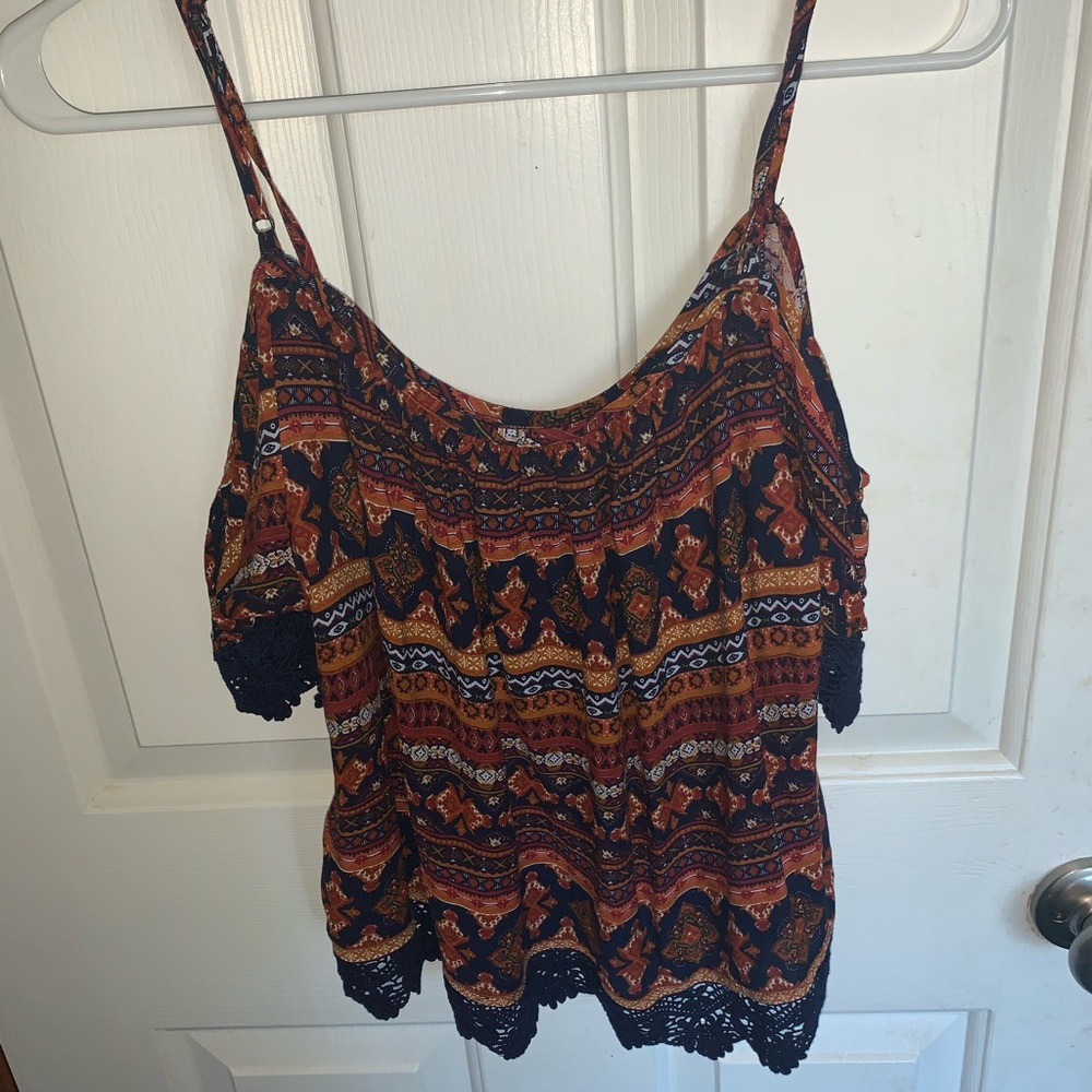 brown and navy off the shoulder shirt